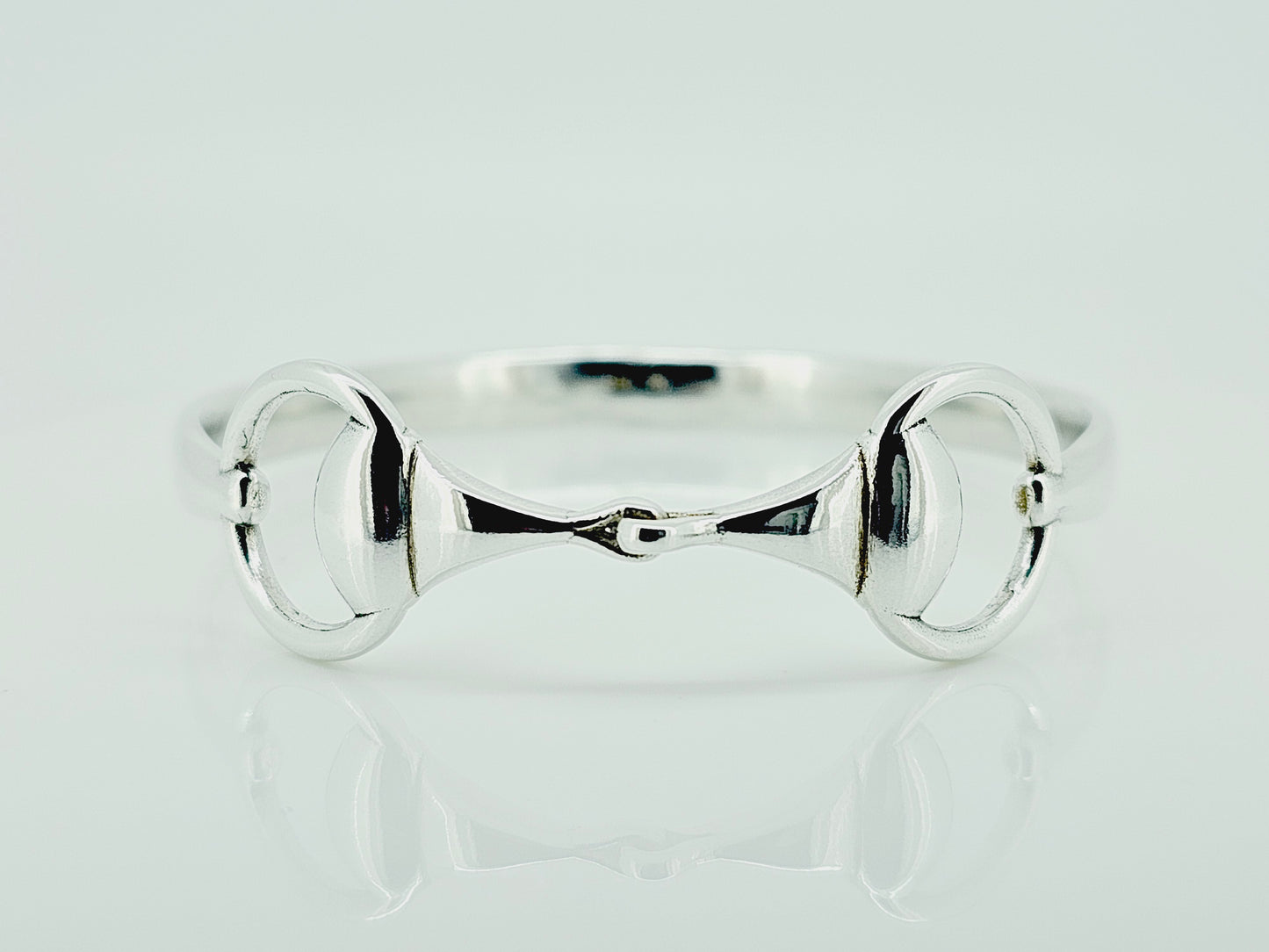 The most popular Crawford Hill bangle. The Snaffle Bangle in sterling silver.