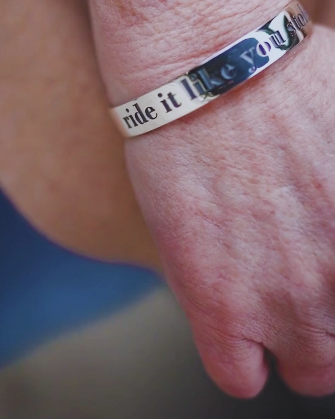 Ride it like you stole it bangle worn by a horse rider. By Crawford hill Equestrian Jewellery