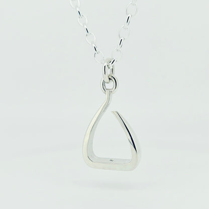 Silver Jump Stirrup Pendant with a ring bale. 