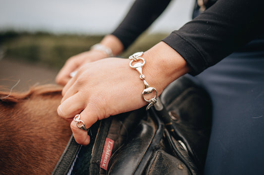Three snaffle sterling silver bracelet and a sterling silver snaffle ring