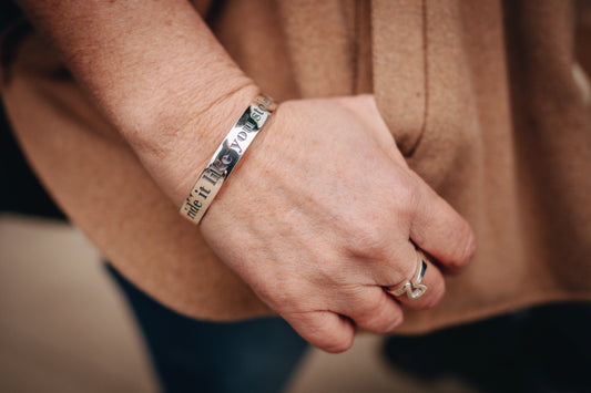Ride it like you stole it! An equestrians favorite saying! Featured here in sterling silver with black enamel inside the wording. 
