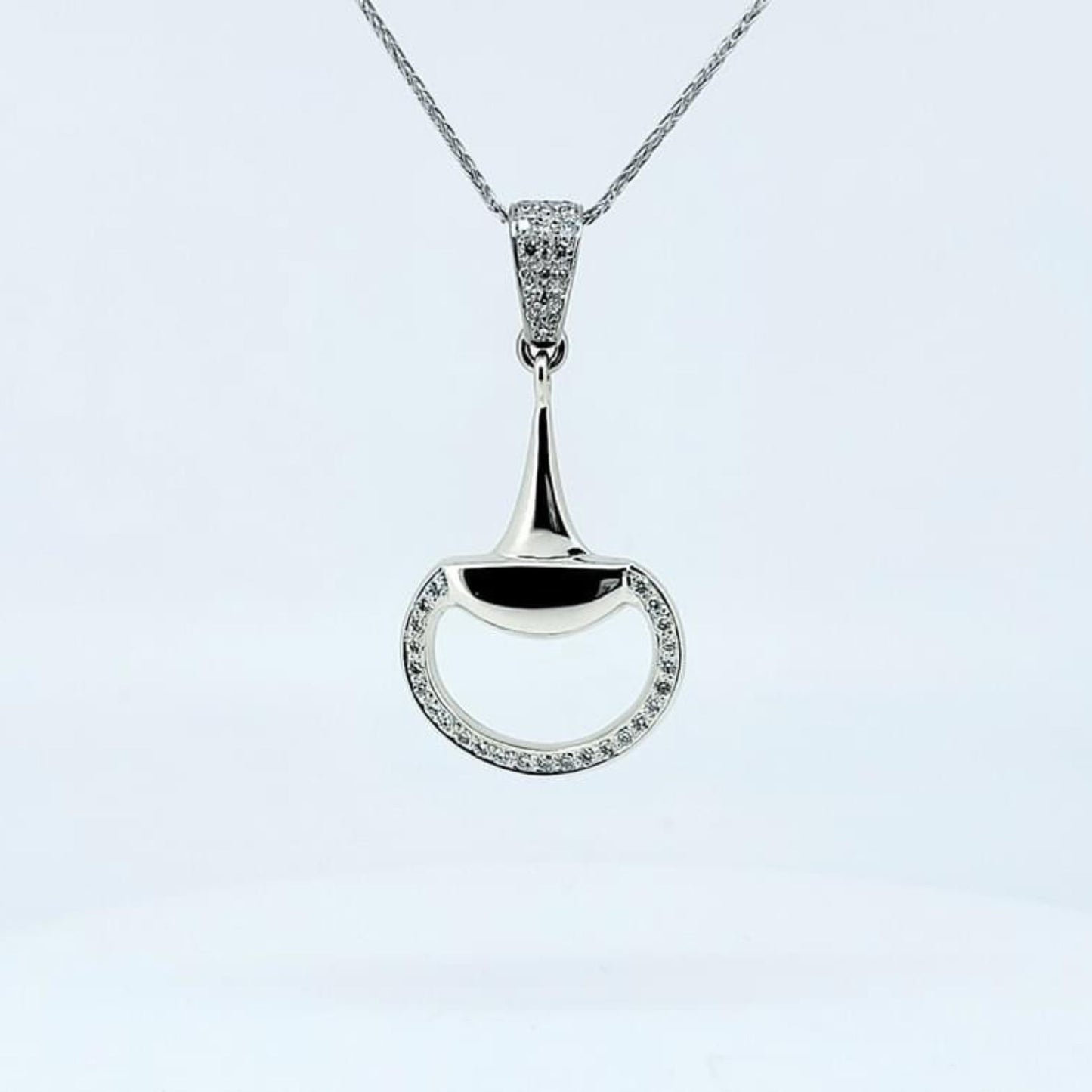 Diamond set snaffle pendant in white gold by Crawford Hill Equestrian Jewellery.