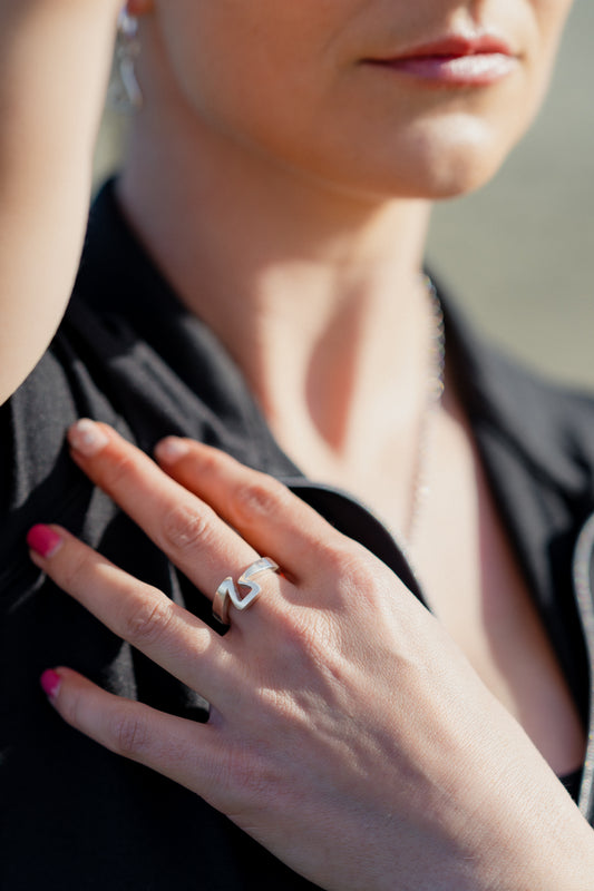 Equestrian wearing a sterling silver Jump Ring. The Jump Ring pays homage to the iconic Free Jump Stirrup. 